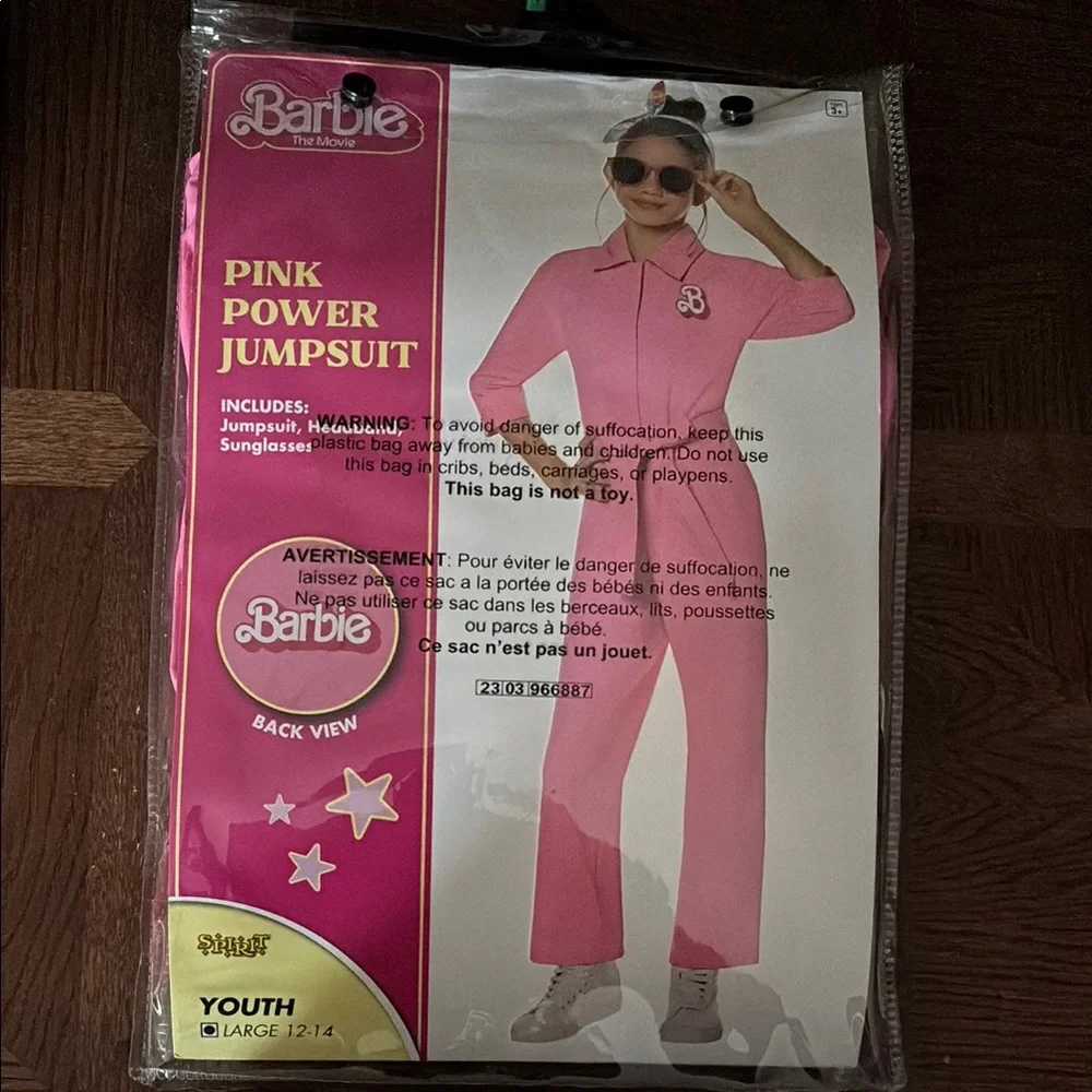 NWT  Spirit Halloween Barbie the Movie Kids Pink Power Jumpsuit size large 12-13